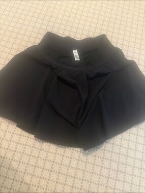 Lululemon skirt worn once! Has biker shorts inside